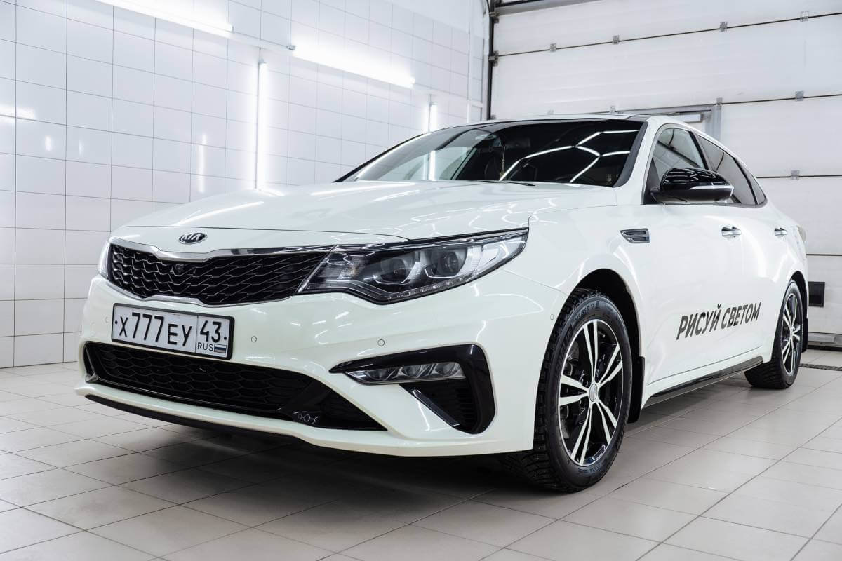 Миниатюра Оклейка люминесцентной пленкой Kia Optima - «Светомобиль»