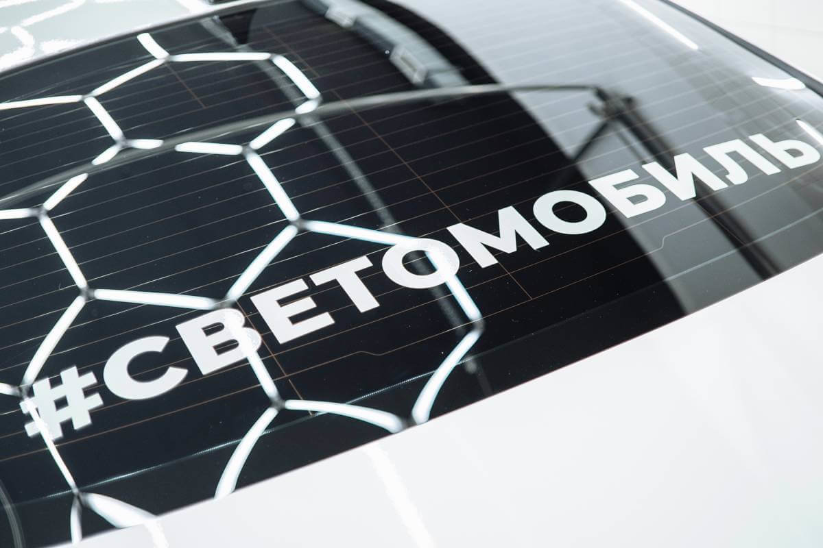 Миниатюра Оклейка люминесцентной пленкой Kia Optima - «Светомобиль»